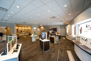 interior of the store showing displays of iPhones and tablets