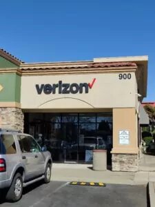 Folsom, California Verizon Store located at corner of shopping plaza with large Verizon signage above door.