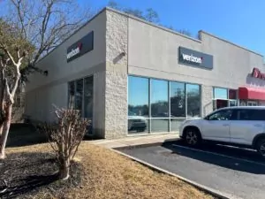 Verizon store in Hartselle, Alabama showing exterior of building corner shop with storefront windows.