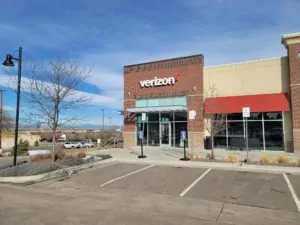 Northglenn, Colorado Verizon Store in corner of shopping mall with red brick entryway.
