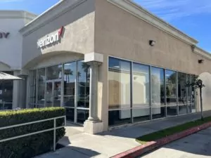 Redlands, California Verizon store corner unit with storefront glass.