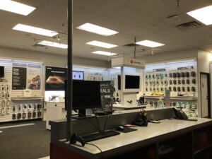 Interior of Verizon store showing smartphone display wall