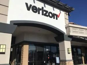 Maricopa, Arizona Verizon store exterior with large signage and terrace above the entrance and storefront door and windows.