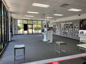 Interior of Verizon store showing wall with display cases