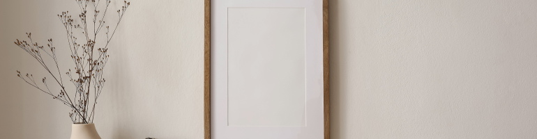 frame hung on a wall showing composition