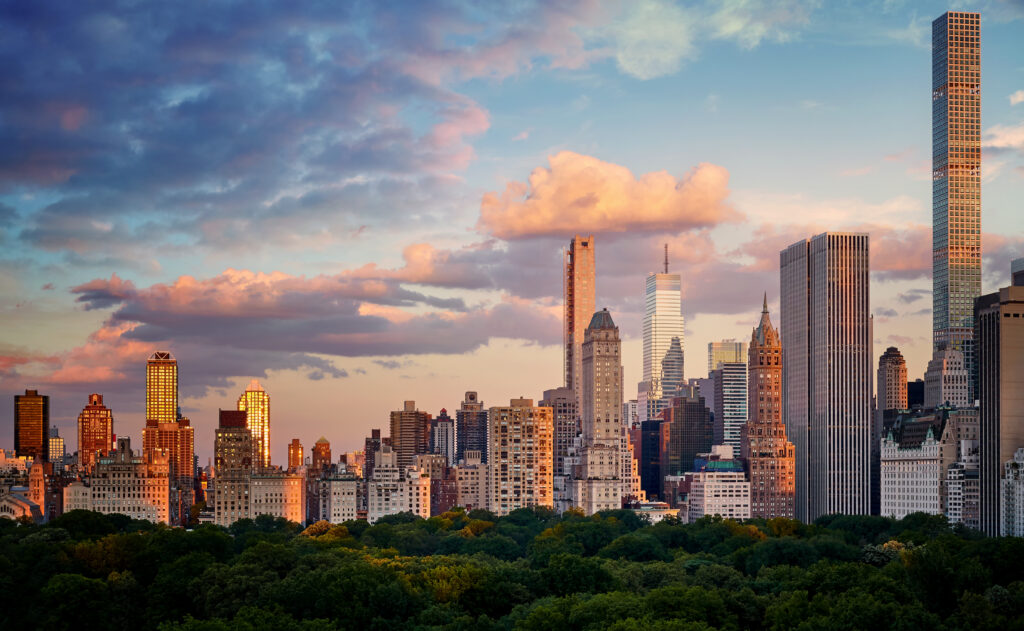 New York City Upper East Side skyline over the Central Park at sunset, USA.