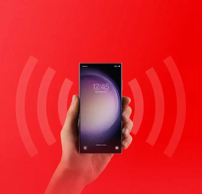 Hand holding a smartphone with signal wave graphics on a red background.