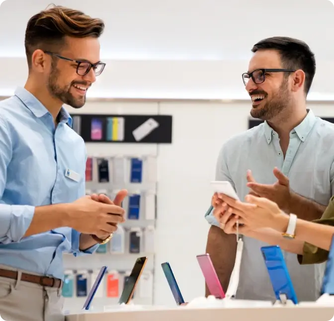Sales associate assists a customer at the Verizon Wireless store in Naples, Florida.
